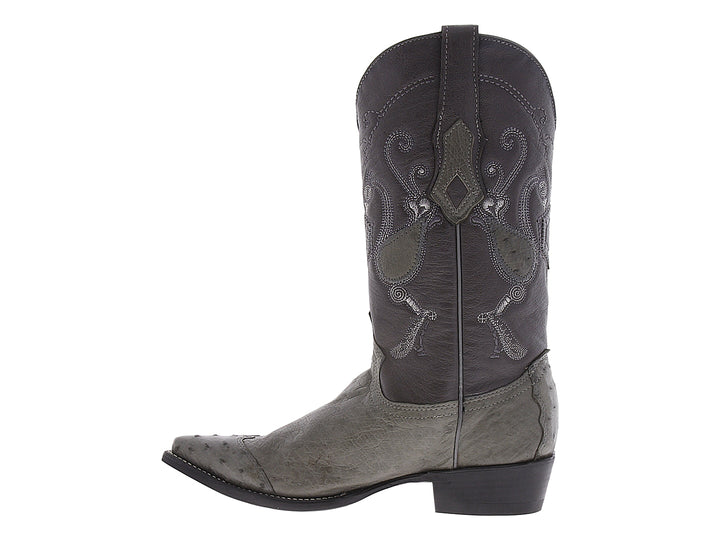 Bota vaquera de cuero color gris con bordados ornamentales en el tallo y punta afilada.