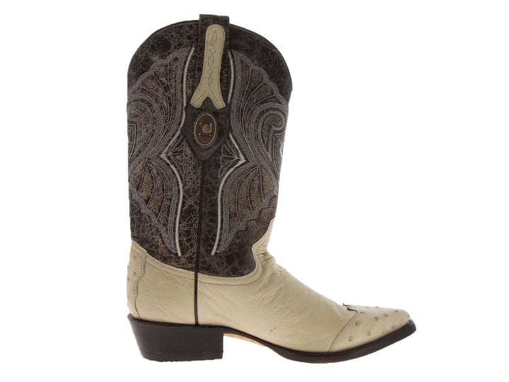 Bota vaquera Cuadra en color hueso con detalles bordados en tonos marrón y gris en la caña.