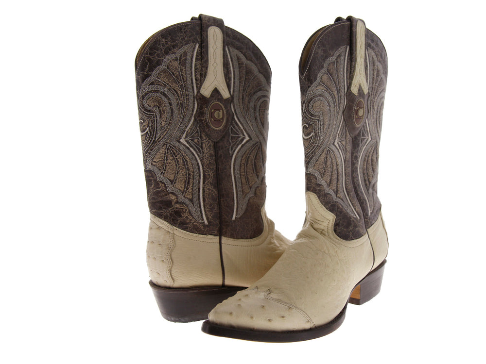 Bota vaquera Cuadra en color hueso con detalles bordados en tonos marrón y gris en la caña.