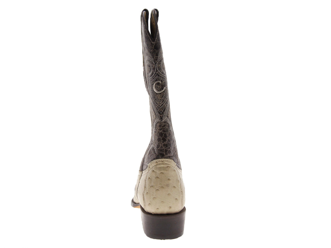 Bota vaquera Cuadra en color hueso con detalles bordados en tonos marrón y gris en la caña.