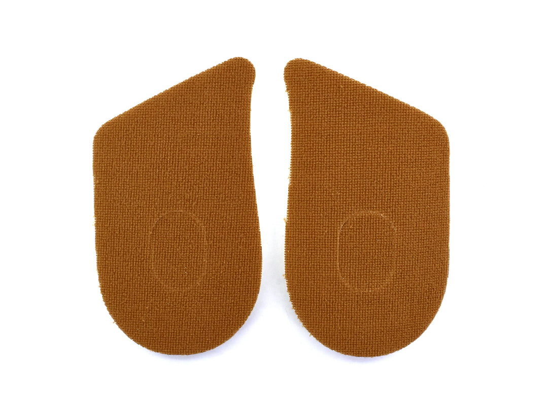 Par de taloneras color beige marca Troy para amortiguar el talón en el calzado.