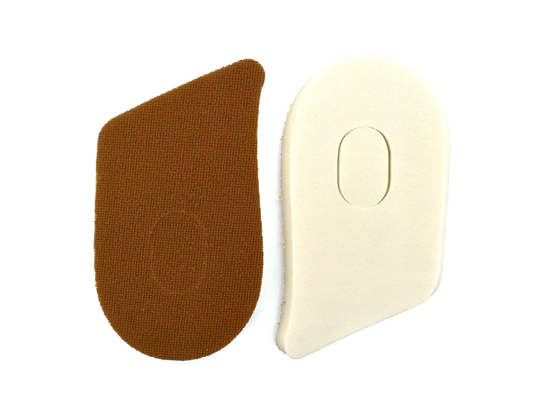 Par de taloneras color beige marca Troy para amortiguar el talón en el calzado.