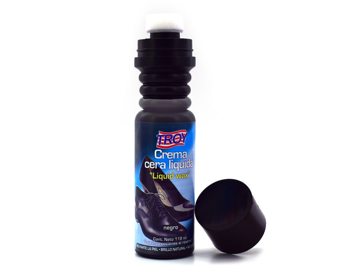 Botella de crema cera líquida TROY color negro con tapa negra y envase blanco.