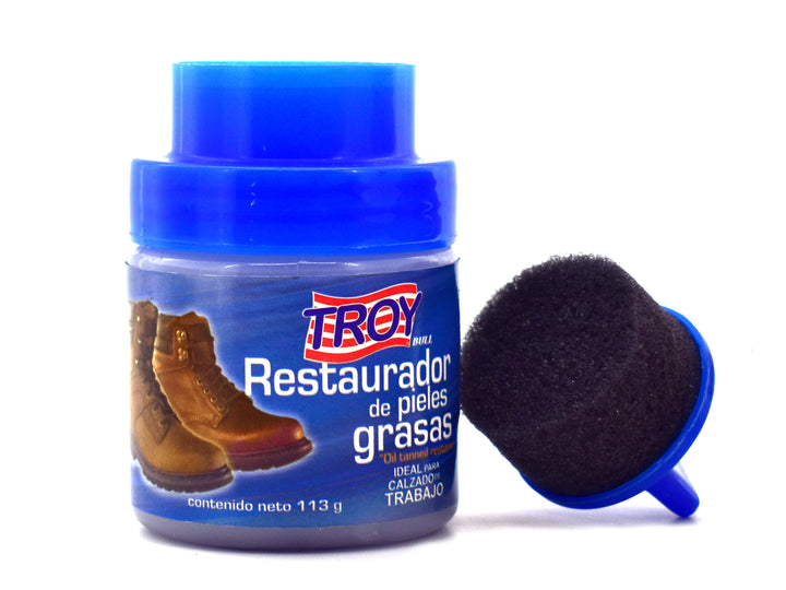Botella blanca de Restaurador de Pieles Grasas Troy de 113ml con etiqueta azul.
