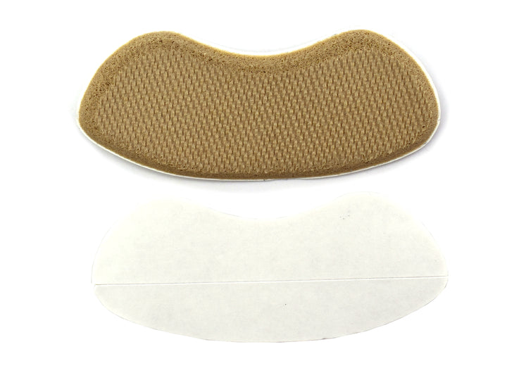 Par de taloneras de gel color beige marca Troy en empaque plástico.