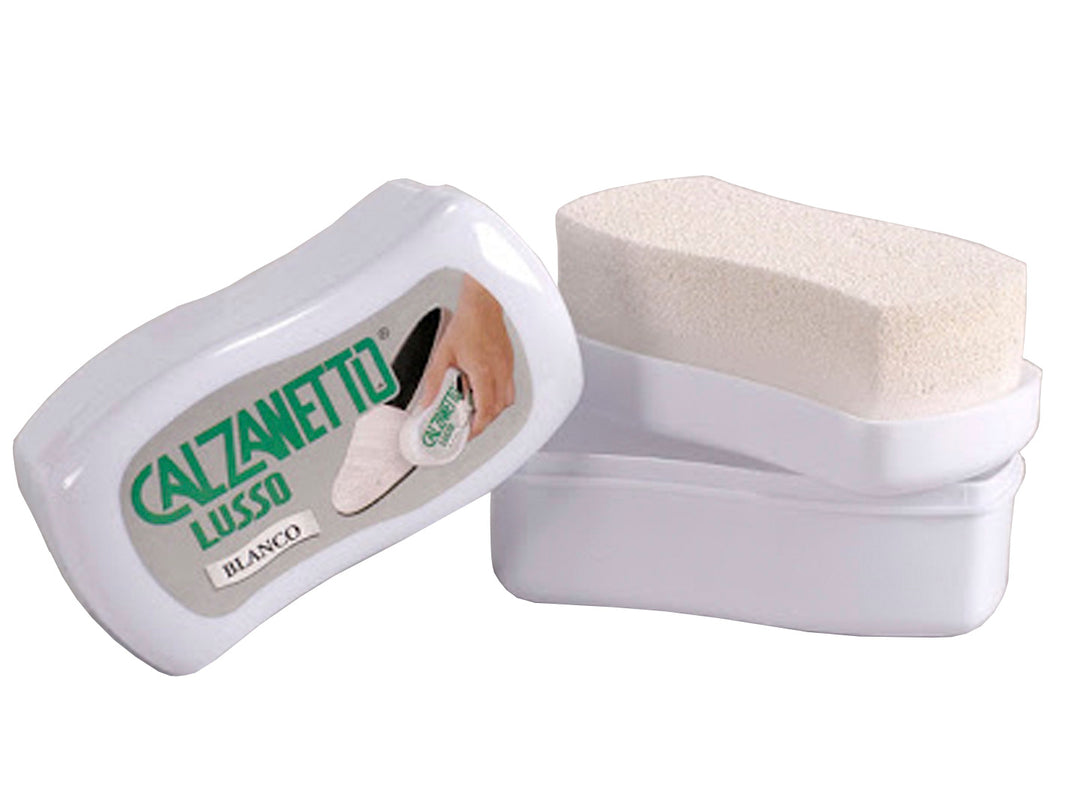 Esponja abrillantadora Calzanetto blanca con su contenedor de plástico blanco.