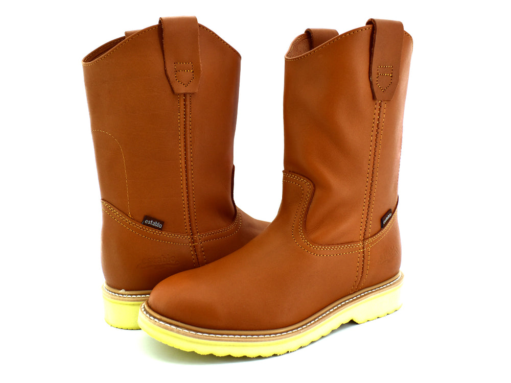 Bota de cuero color miel con suela amarilla gruesa, estilo western para hombre.