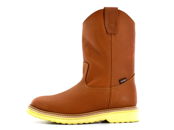 Bota de cuero color miel con suela amarilla gruesa, estilo western para hombre.