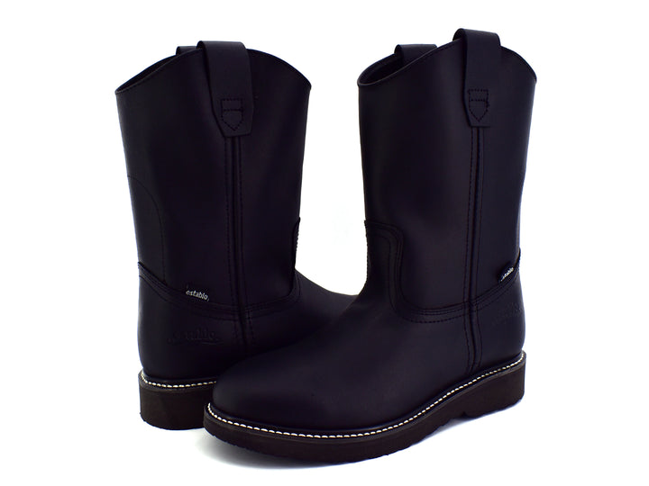 Bota de cuero color negro estilo western con acabado mate y suela gruesa sobre fondo blanco.