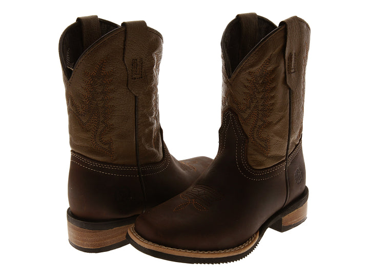 Botas vaqueras para niño en cuero color marrón oscuro y beige.
