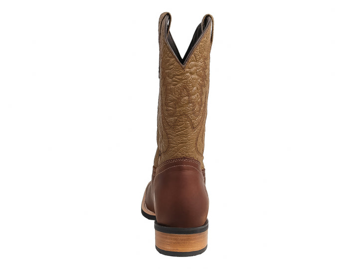 Bota vaquera para niño en color marrón con tubo beige bordado y suela resistente.