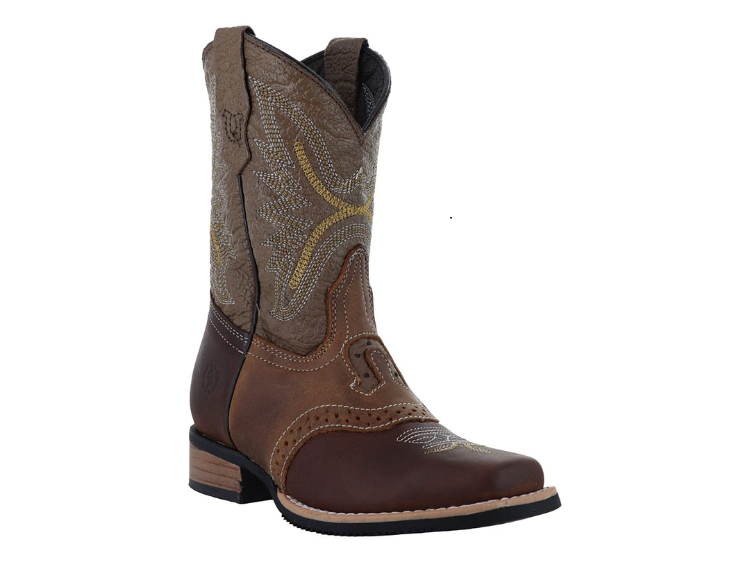 Bota vaquera para niño en colores marrón y beige con costuras decorativas amarillas.