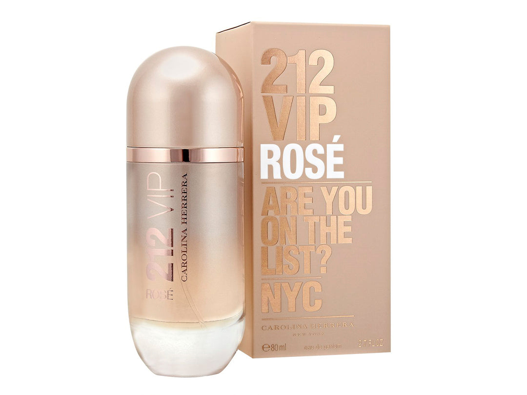 Perfume Carolina Herrera 212 VIP Rosé con su caja en color champagne dorado.