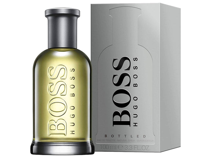 Perfume Hugo Boss Bottled en botella de vidrio con líquido amarillo y su caja plateada