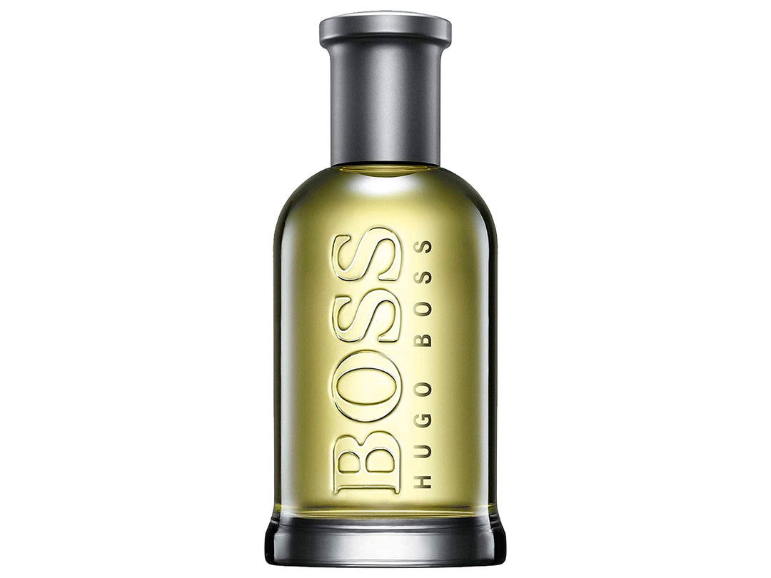 Perfume Hugo Boss Bottled en botella de vidrio con líquido amarillo y su caja plateada
