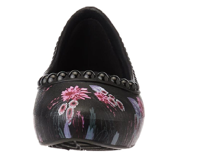 Zapatos planos Crocs Luxe para mujer en color negro con estampado floral en tonos plum.