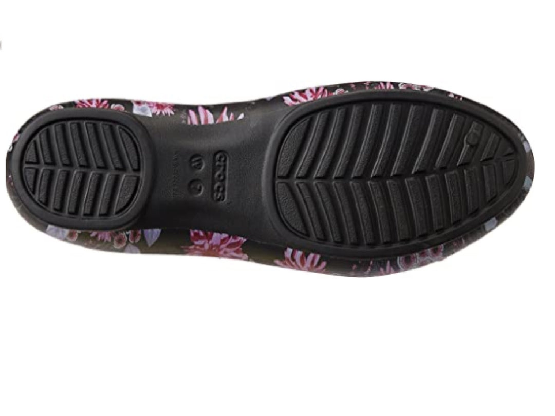 Zapatos planos Crocs Luxe para mujer en color negro con estampado floral en tonos plum.
