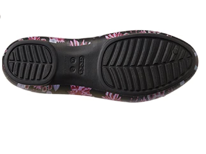 Zapatos planos Crocs Luxe para mujer en color negro con estampado floral en tonos plum.
