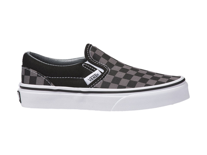 Tenis Vans Classic Slip-On para niño con diseño de cuadros en color negro y gris con suela blanca.
