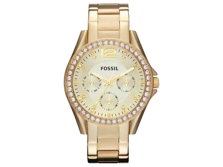 Reloj Fossil dorado con bisel decorado con cristales y correa de eslabones metálicos.