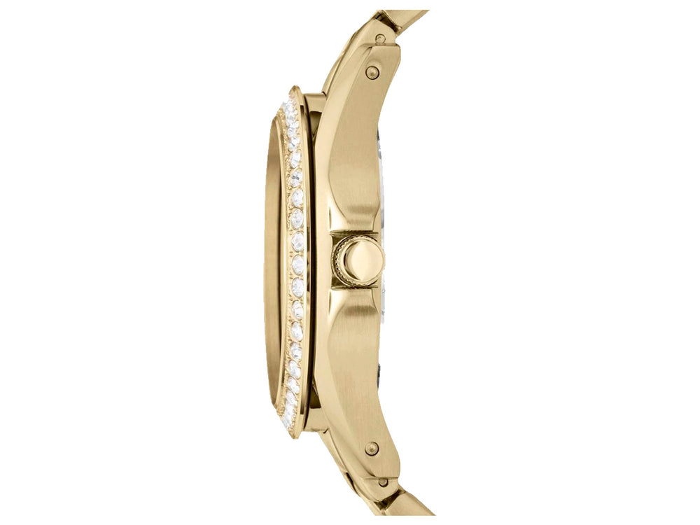 Reloj Fossil dorado con bisel decorado con cristales y correa de eslabones metálicos.