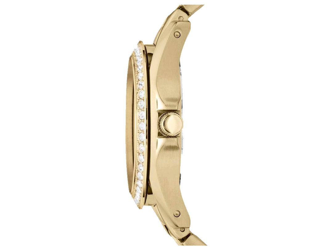 Reloj Fossil dorado con bisel decorado con cristales y correa de eslabones metálicos.
