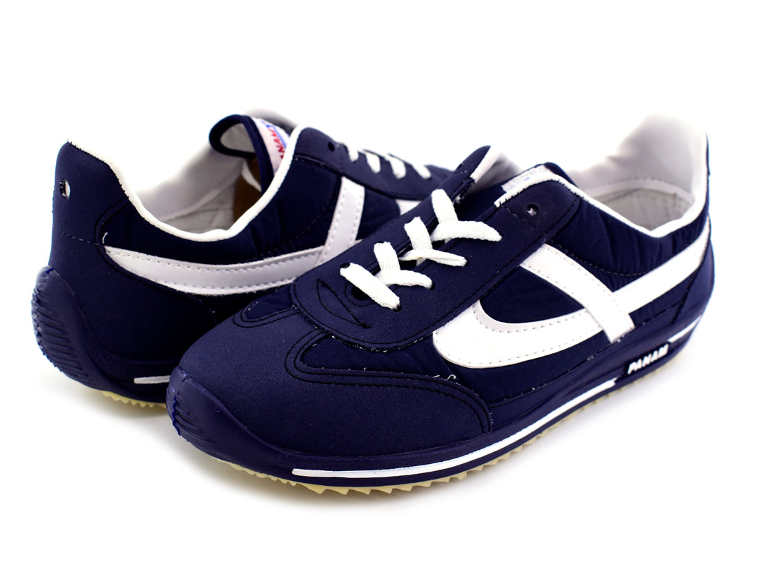 Tenis Panam Retro para hombre en color azul marino con franja y cordones blancos.