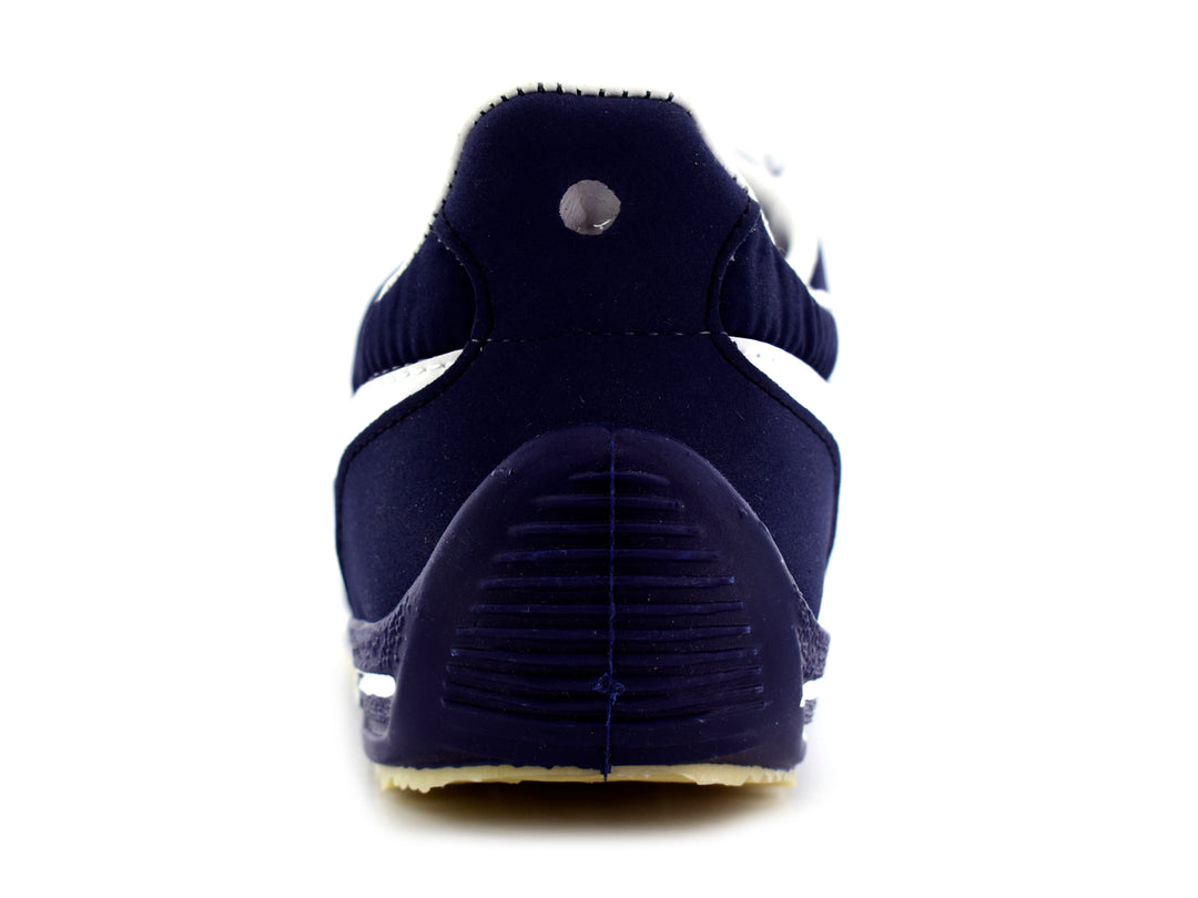 Tenis Panam Retro para hombre en color azul marino con franja y cordones blancos.