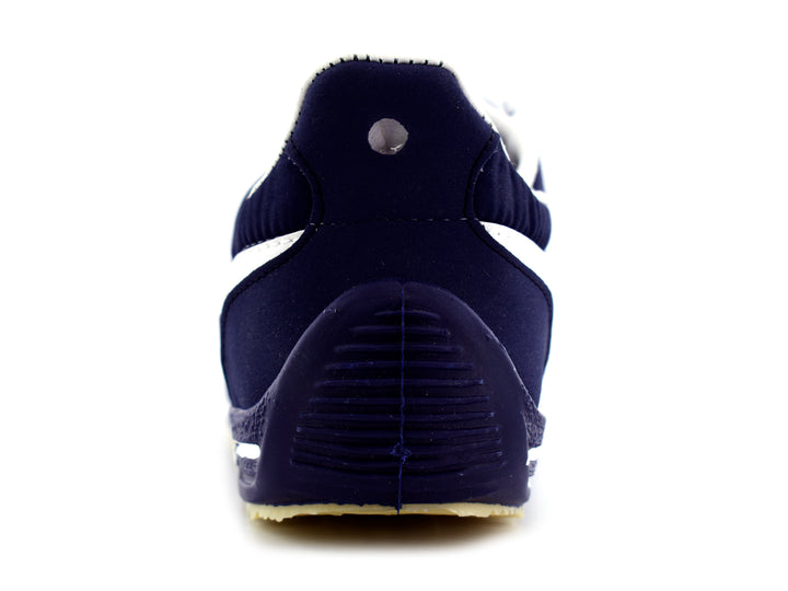 Tenis Panam Retro para hombre en color azul marino con franja y cordones blancos.