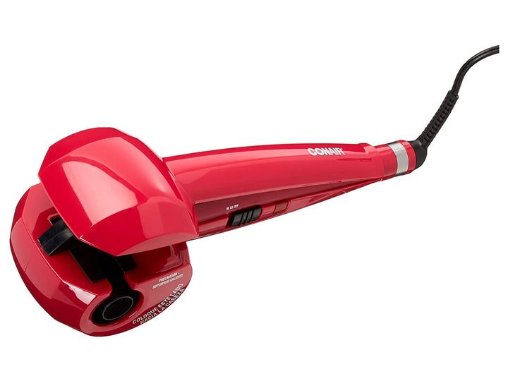 Tenaza rizadora de cabello Conair color rosa brillante con acabado cerámico y turmalina.