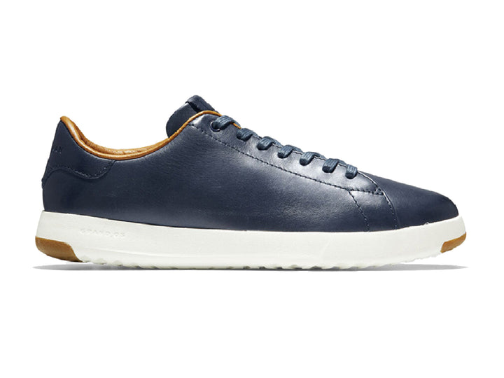 Tenis Cole Haan Grandpro para hombre en color azul blazer con suela blanca y detalles en café.
