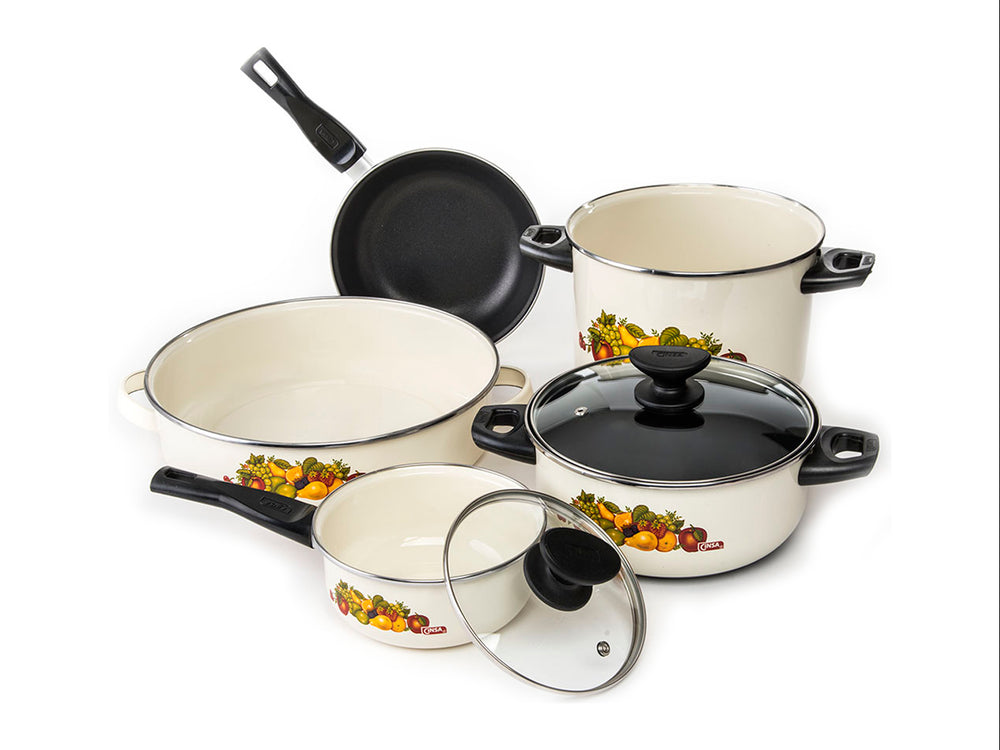 Batería de cocina blanca de 7 piezas con detalles de vegetales y mangos negros.