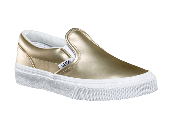 Zapato Vans slip-on para niño en color dorado metálico con suela blanca clásica.