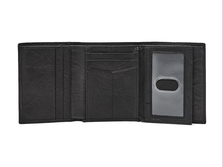 Cartera Fossil de cuero color negro con textura rugosa y logotipo grabado en la parte inferior.
