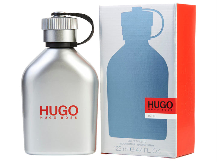 Botella de perfume Hugo Boss Iced en color plata junto a su empaque gris y rojo.