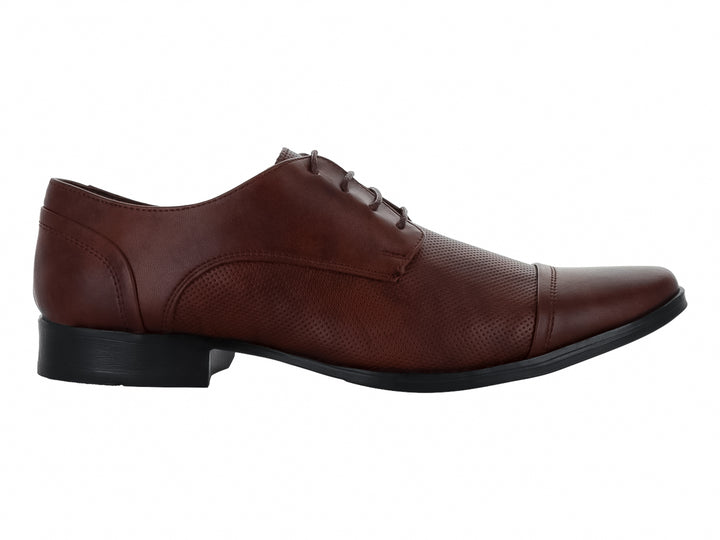 Zapato formal Oxford color miel para hombre con textura granulada y suela negra.