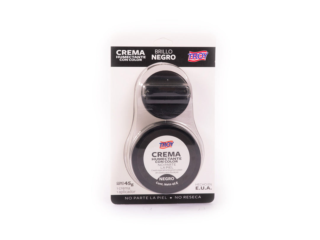 Crema humectante para zapatos color negro marca Troy con aplicador en empaque blister.