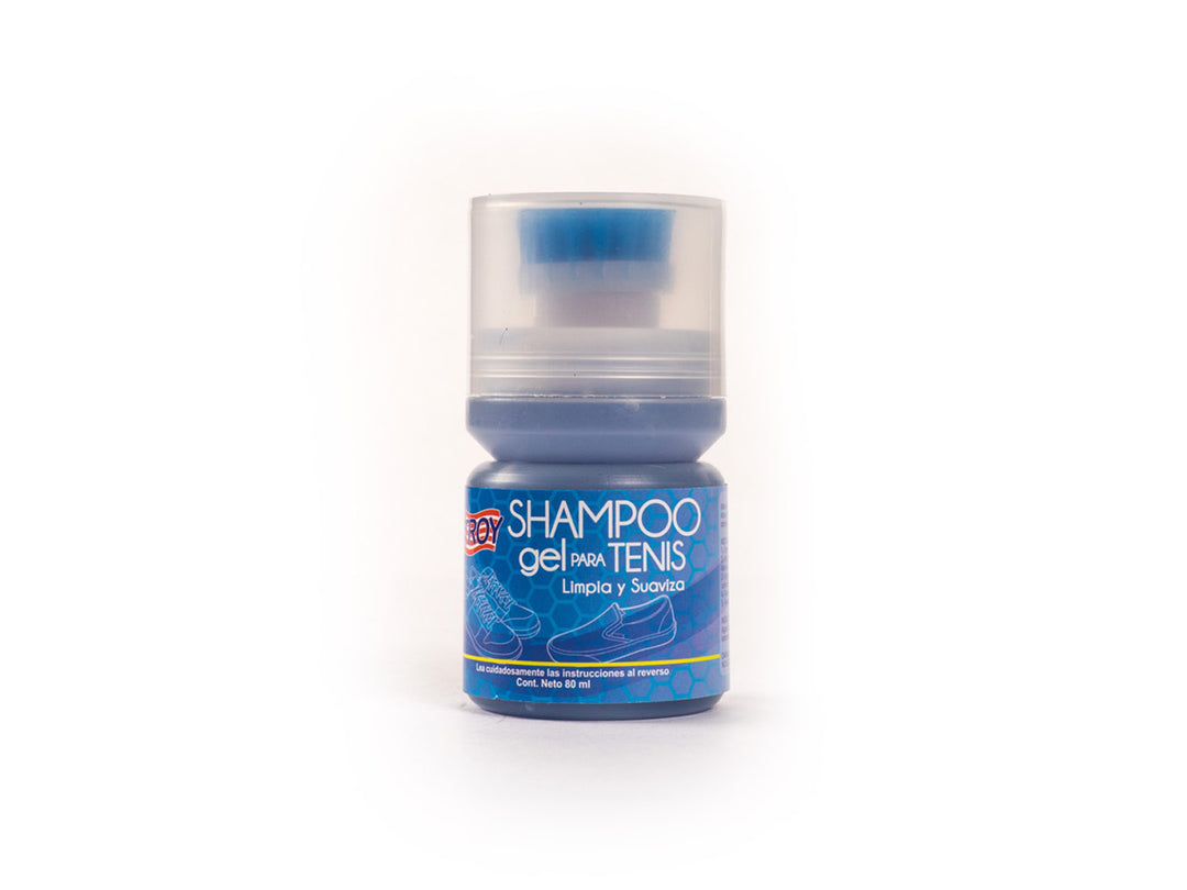 Botella pequeña de shampoo en gel para tenis marca Troy color azul con cepillo integrado y tapa transparente.
