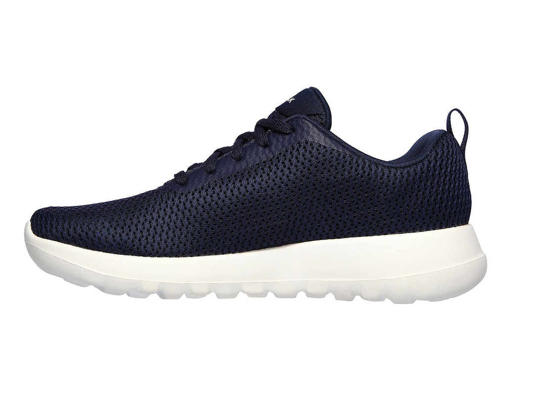 Tenis deportivos Skechers para mujer en color azul marino con suela blanca.
