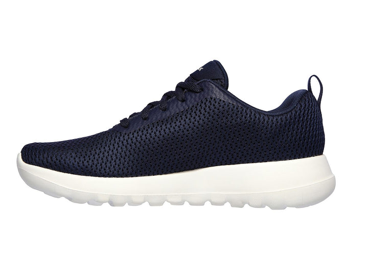 Tenis deportivos Skechers para mujer en color azul marino con suela blanca.
