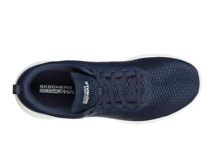 Tenis deportivos Skechers para mujer en color azul marino con suela blanca.