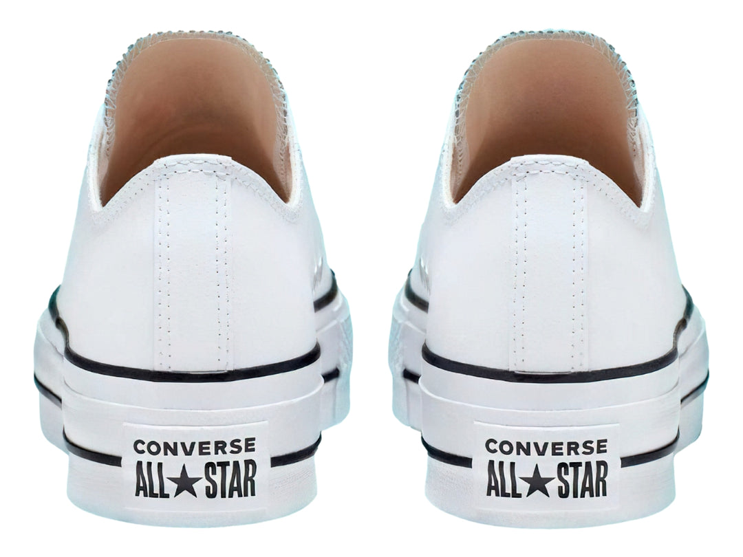Tenis Converse Chuck Taylor All Star Lift Clean Ox en color blanco con suela de plataforma y detalles en negro.