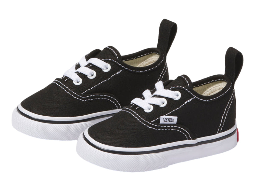 Tenis Vans Authentic negros para niño con agujetas elásticas blancas y suela blanca.