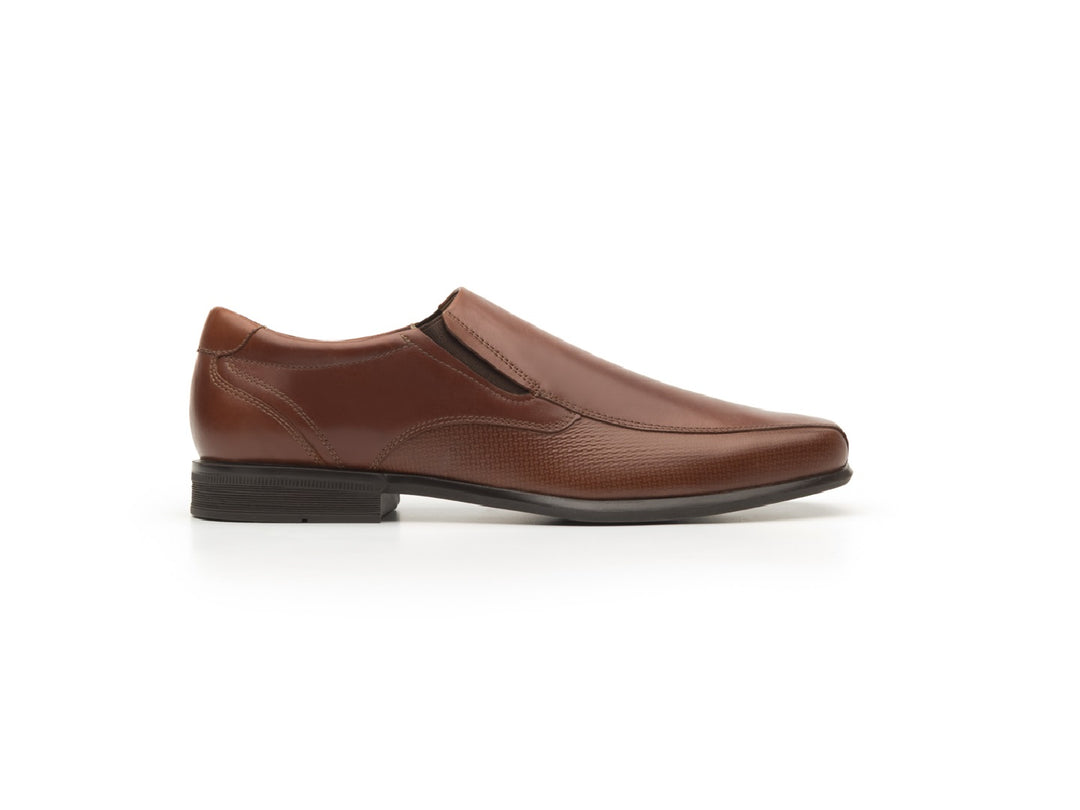 Zapato Flexi Strong para hombre en color tan, estilo mocasín de cuero con suela oscura.