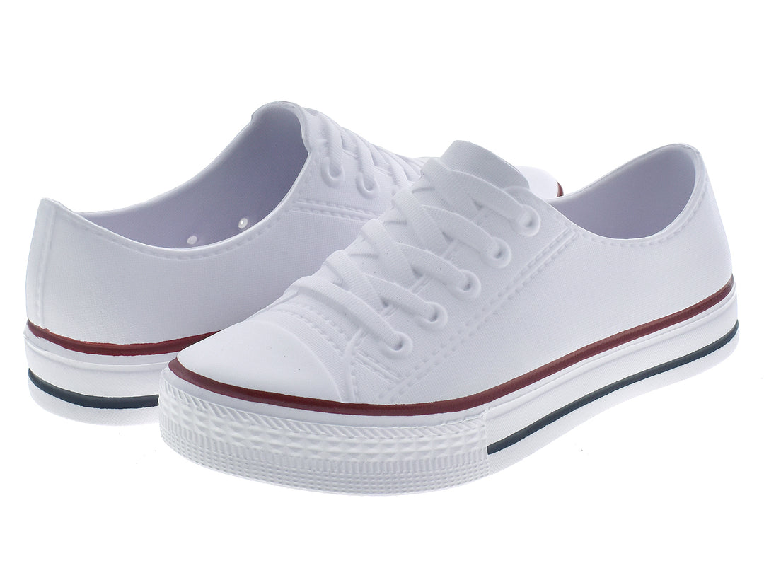 Par de tenis blancos para niños con franjas marrón y gris en la suela.