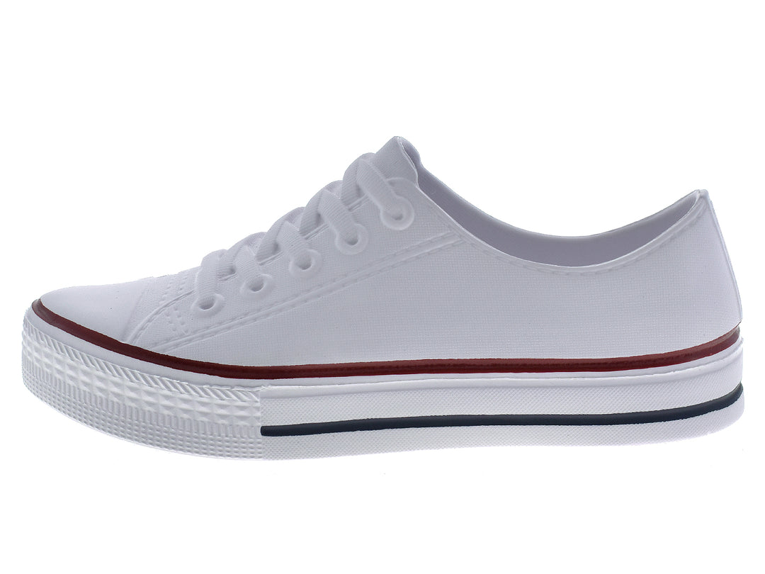 Par de tenis blancos para niños con franjas marrón y gris en la suela.