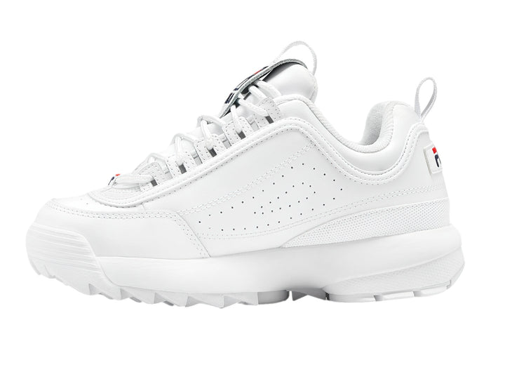 Tenis FILA Disruptor Premium en color blanco con detalles mínimos en azul y rojo, suela gruesa y dentada.