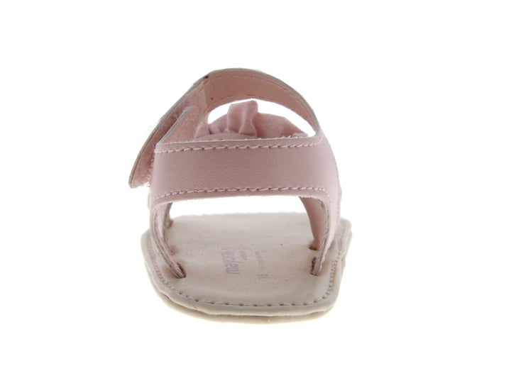 Sandalias color rosa para bebé con detalles de volantes y correas ajustables.