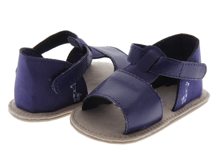 Sandalias para bebé color azul marino con suela gris y cierres ajustables.