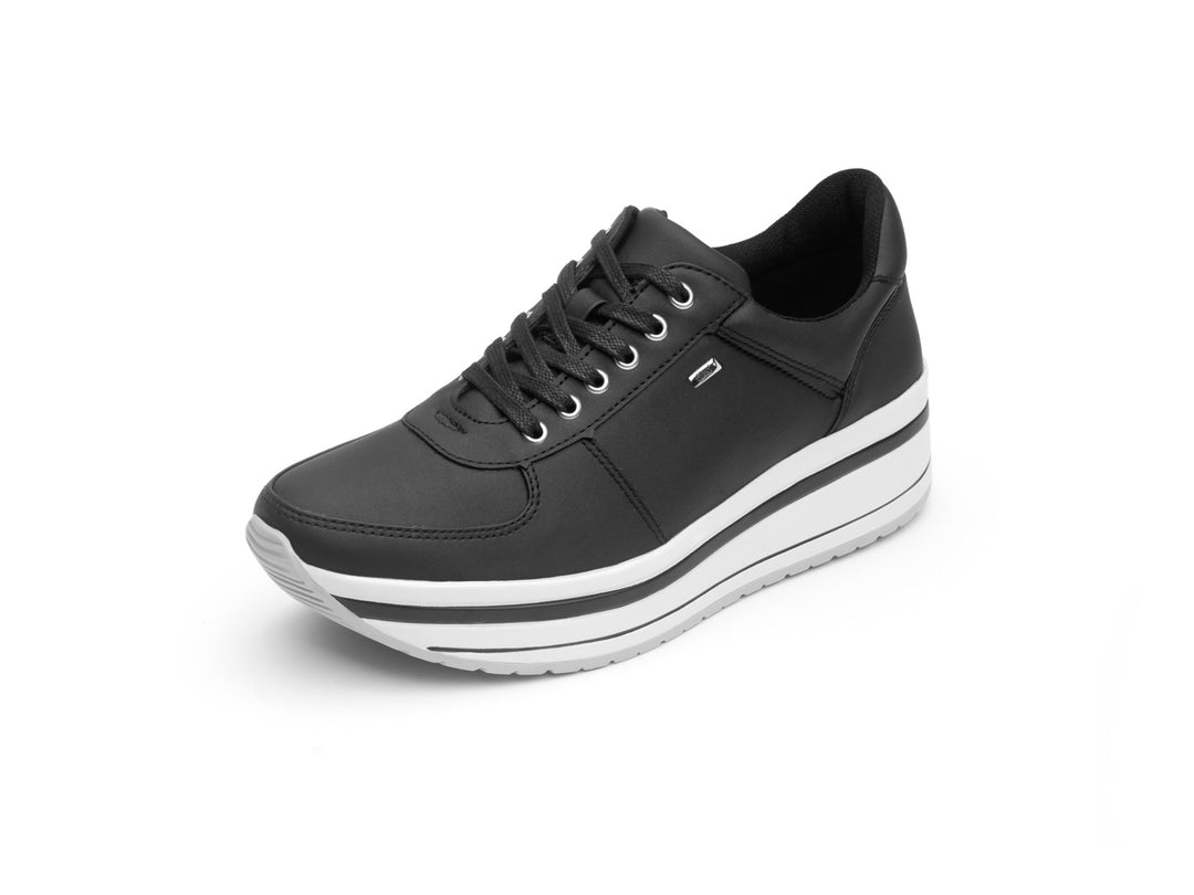 Tenis Flexi Alanis para mujer en color negro con suela blanca y cordones.